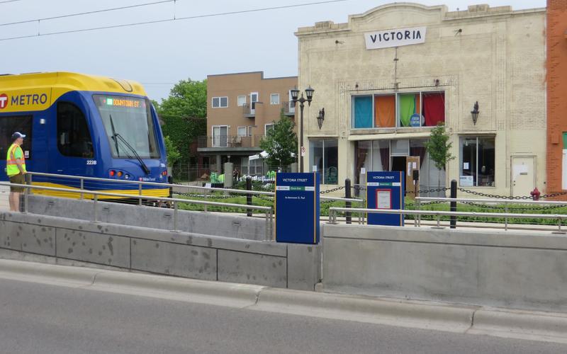 The Green Line light rail approaching the Victoria Theater