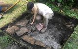 A volunteer archaeologist in the second excavation unit 